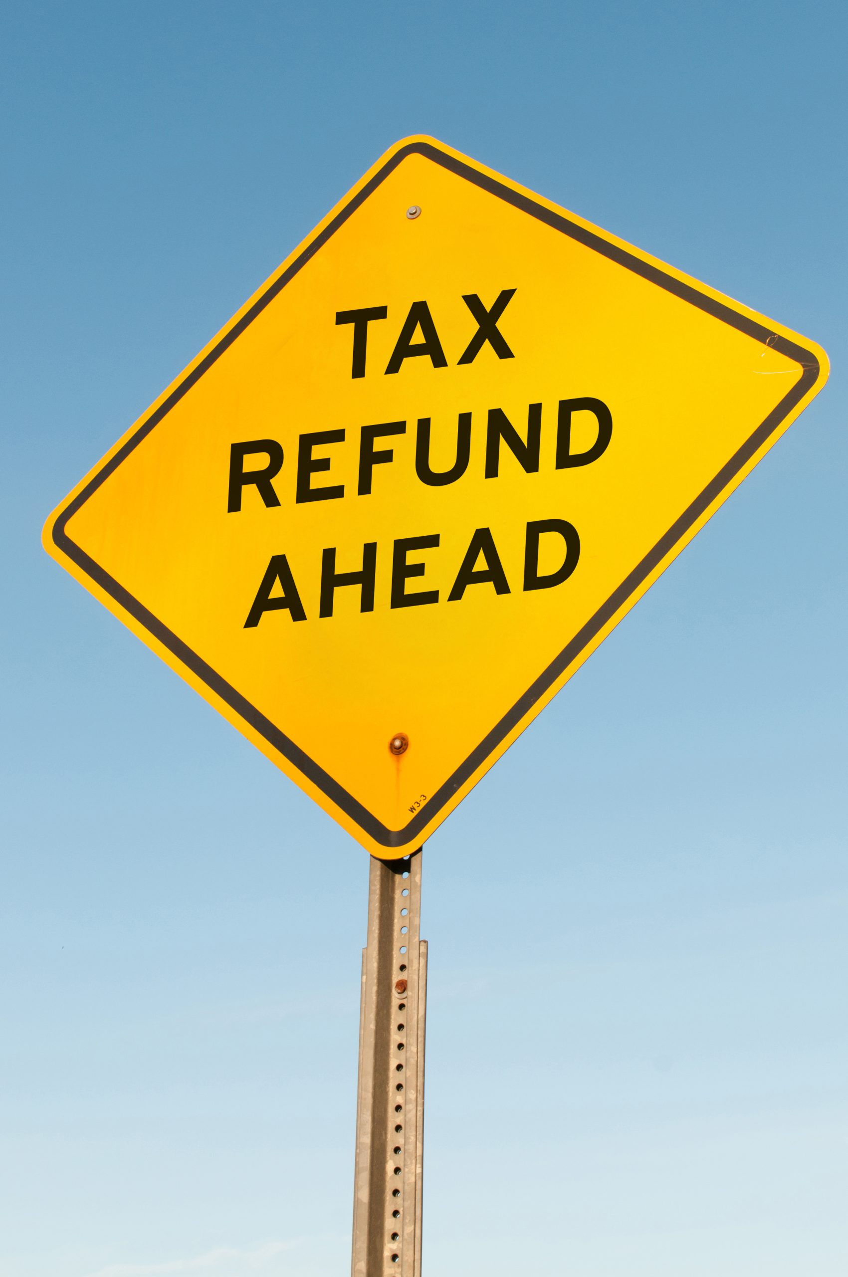 Road,Sign,Announcing,That,A,Tax,Refund,Is,Ahead