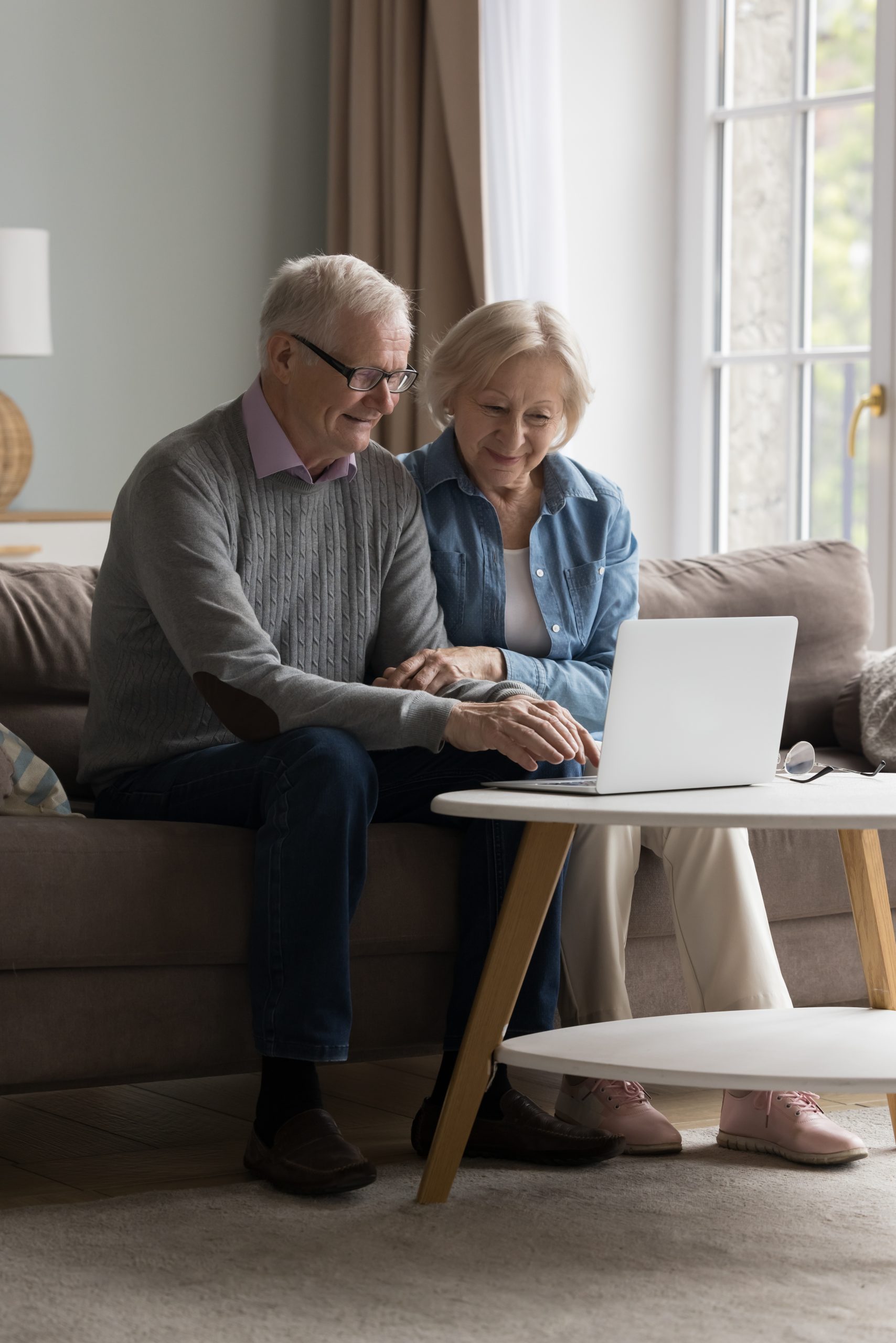 Elderly,Wife,And,Husband,Spend,Leisure,On,Internet,Resting,Together